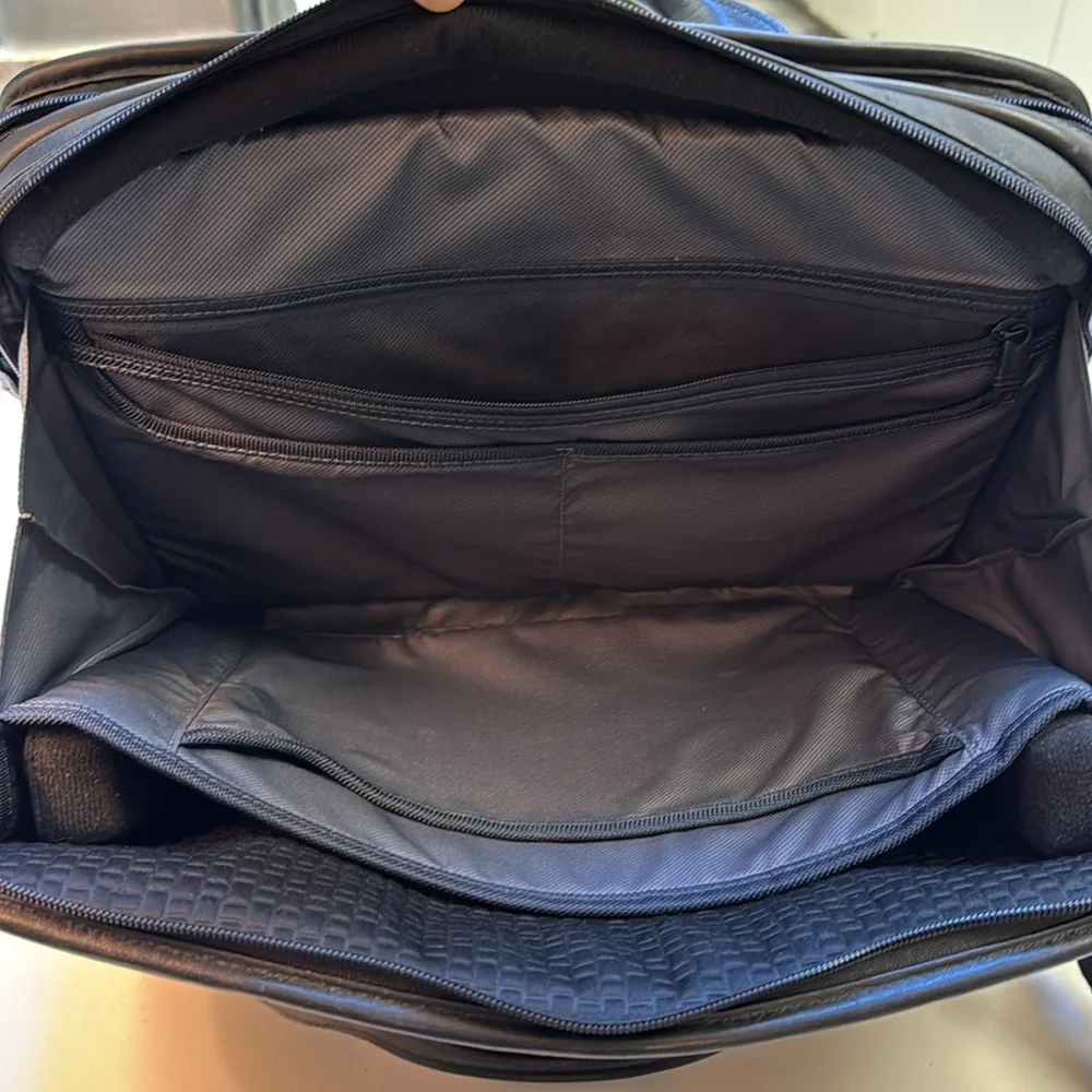 TUMi black leather computer briefcase carry-on VGC long strap multiple pockets