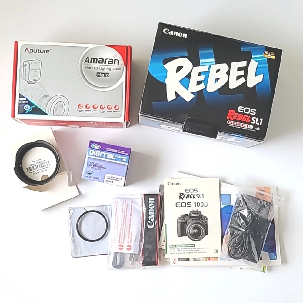 Canon EOS Rebel SL1 Digital SLR with 18-55mm STM Lens