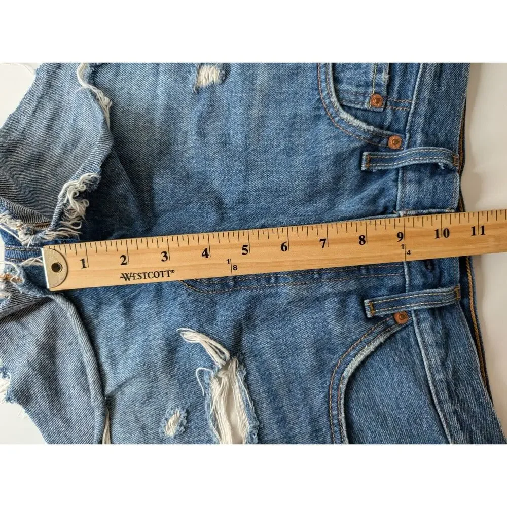 Levis while designed distressed