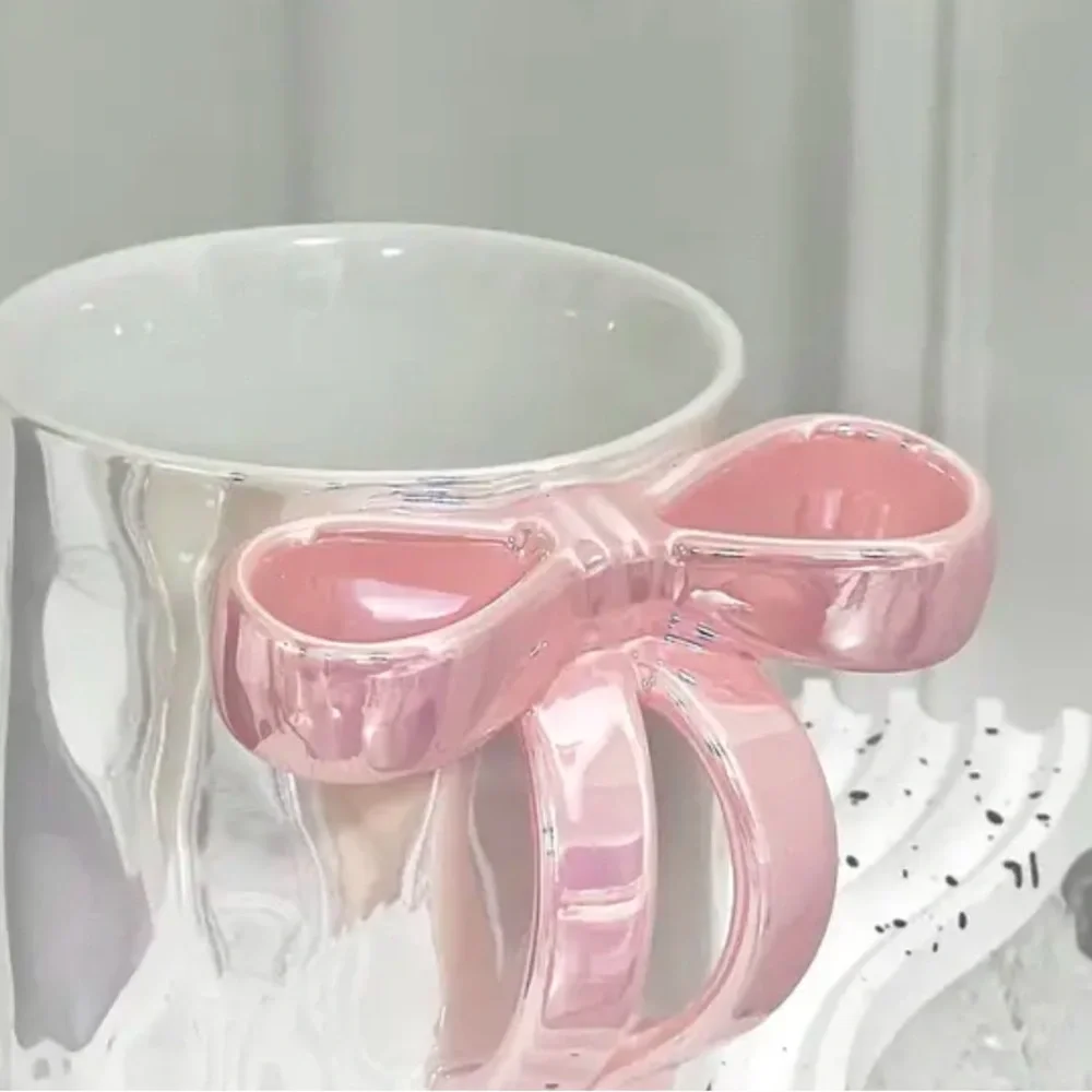 RIBBON HANDLE CUP NEW IN BEAUTIFUL PACKAGE. NIB PINK WHITE AND PURPLE AVAIL
