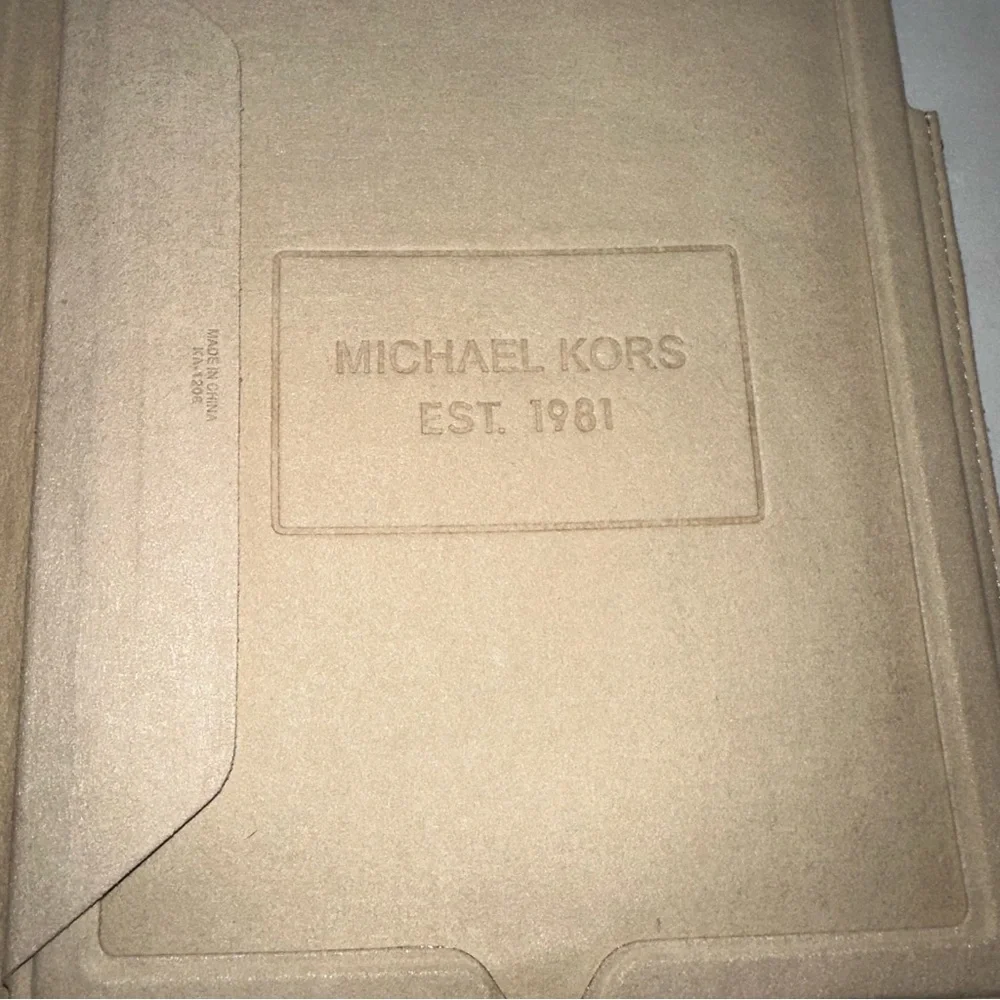 Michael Kors please review