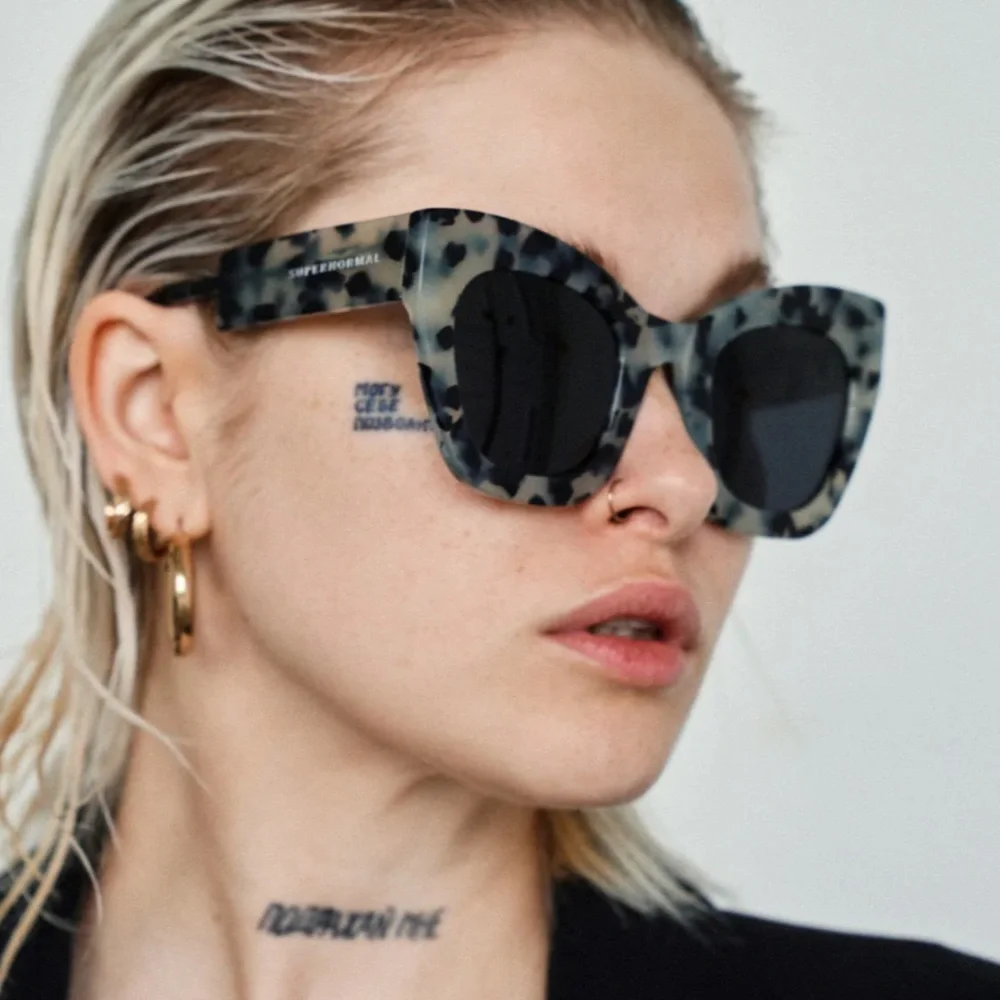 AMBITIOUS Marble frame + Black lenses Supernormal NWOT