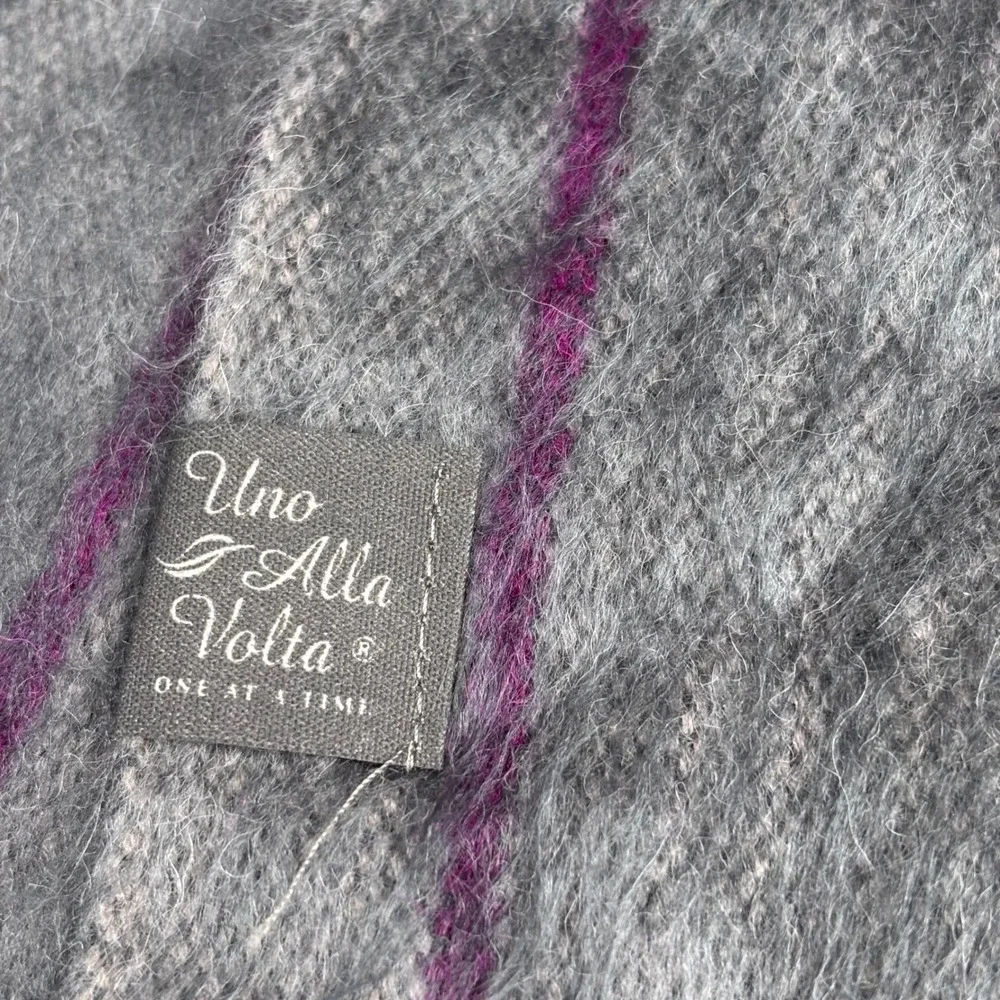 Una Alla Volta una alla