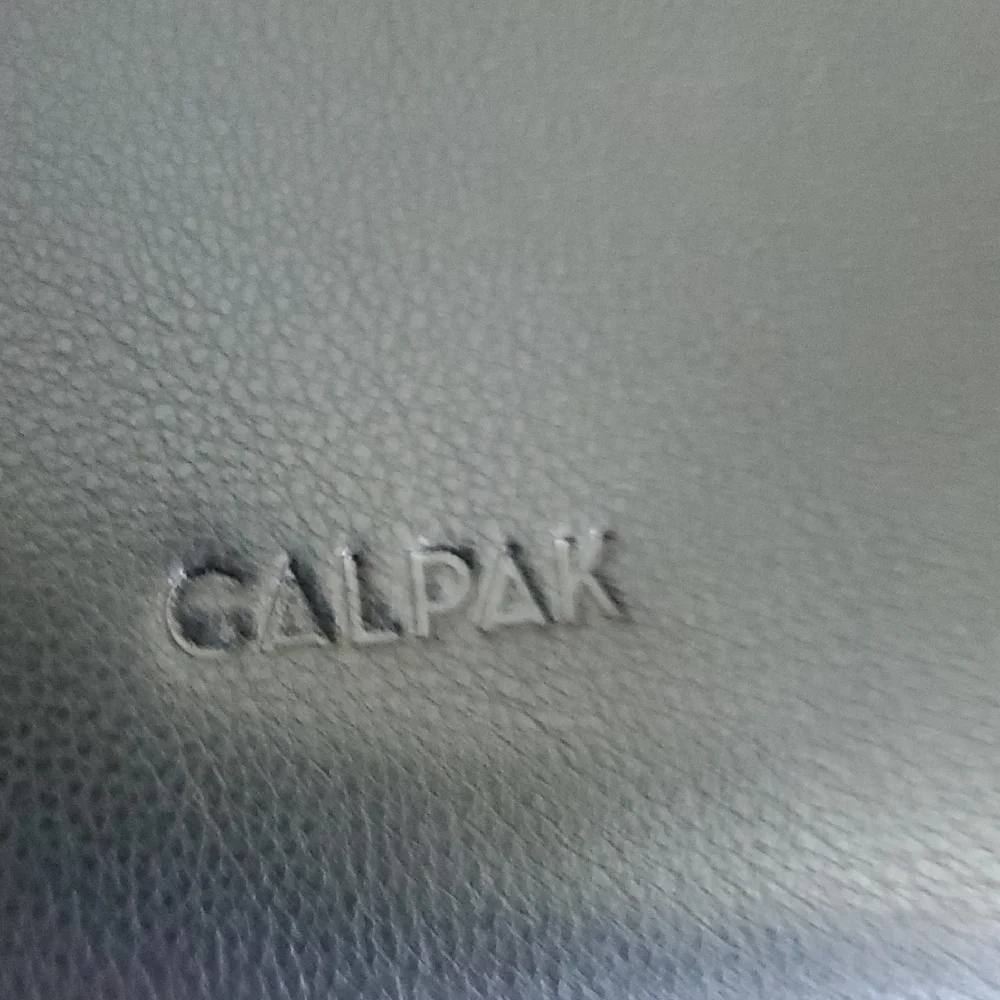 Calpak Sleek Black Laptop Bag for Women
