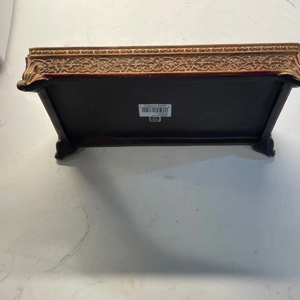 Brown, red and gold rectangular trinket dish