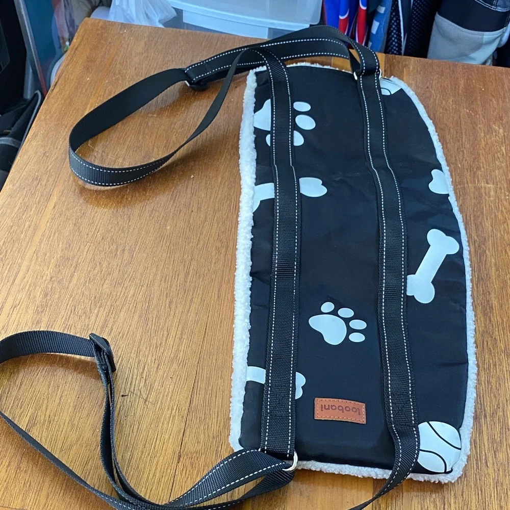 Black Pet Sling with Paw and Bone Pattern
