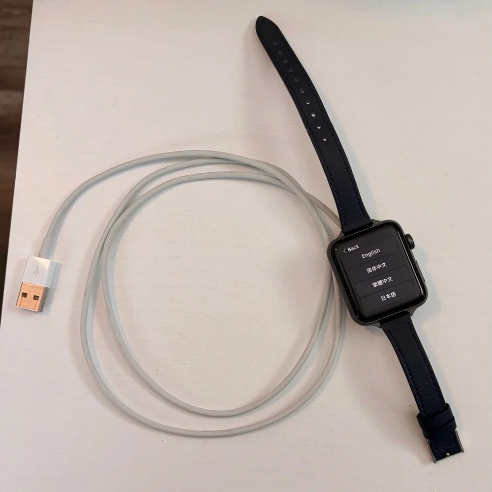 Apple Smartwatch Series 3 42 mm with Navy Strap & Charger.