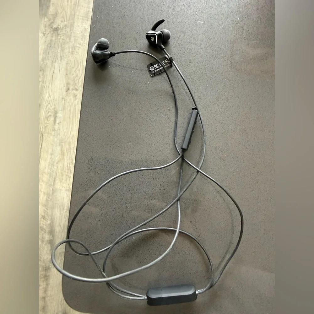 black wireless Bluetooth neckband-style earbuds