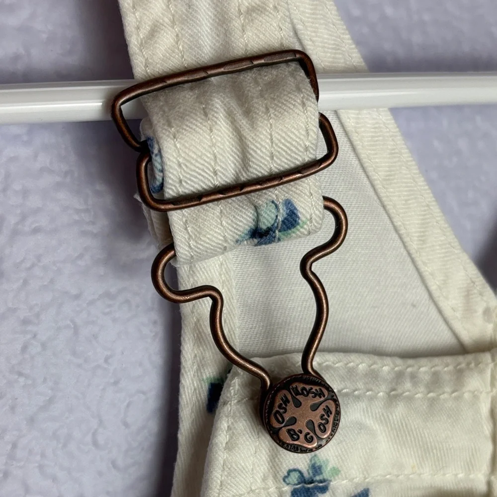 OshKosh B'gosh Ivory Overalls with Blue Floral Design