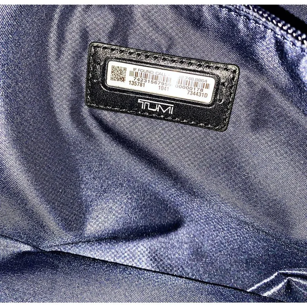 Tumi black leather