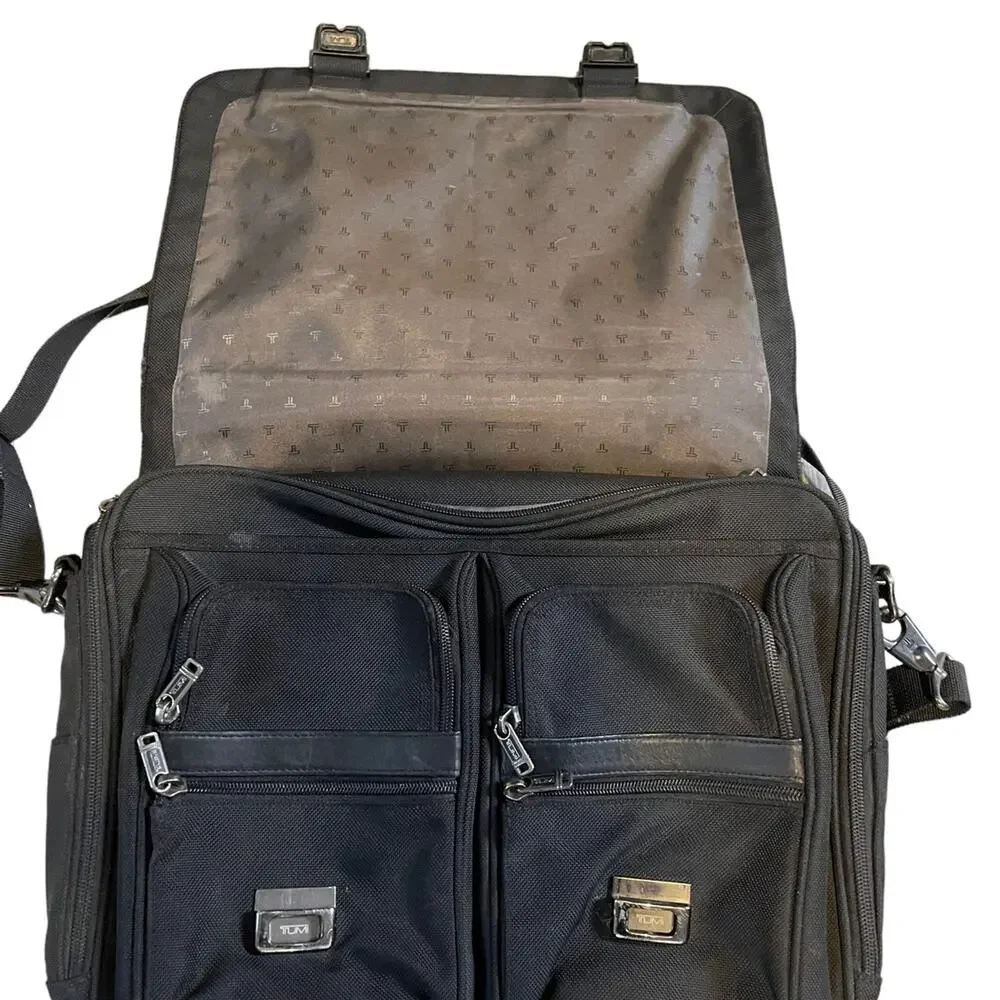 Tumi leather trimmed