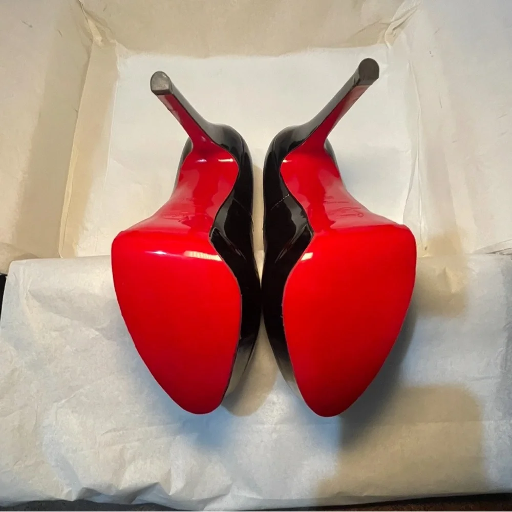 Christian Louboutin presenting naughty