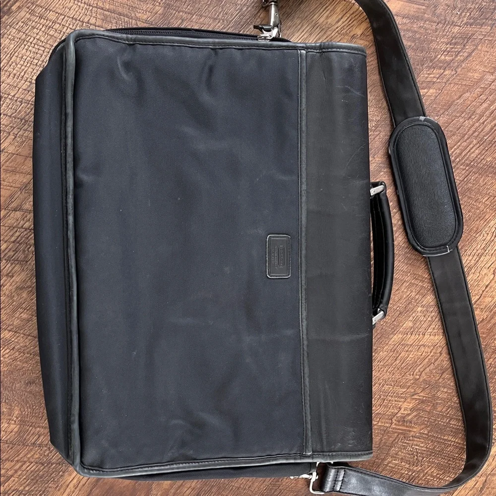 Coach sleek black