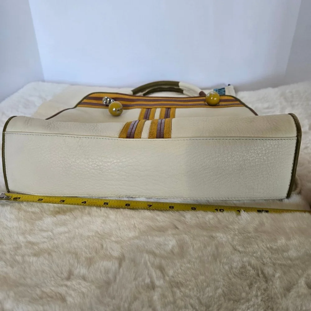 Tory Burch last slight 20%