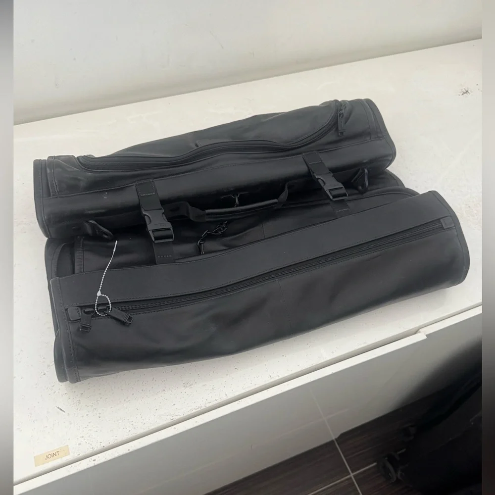 Tumi sleek black