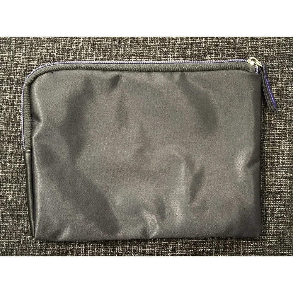 Tumi delta cosmetic