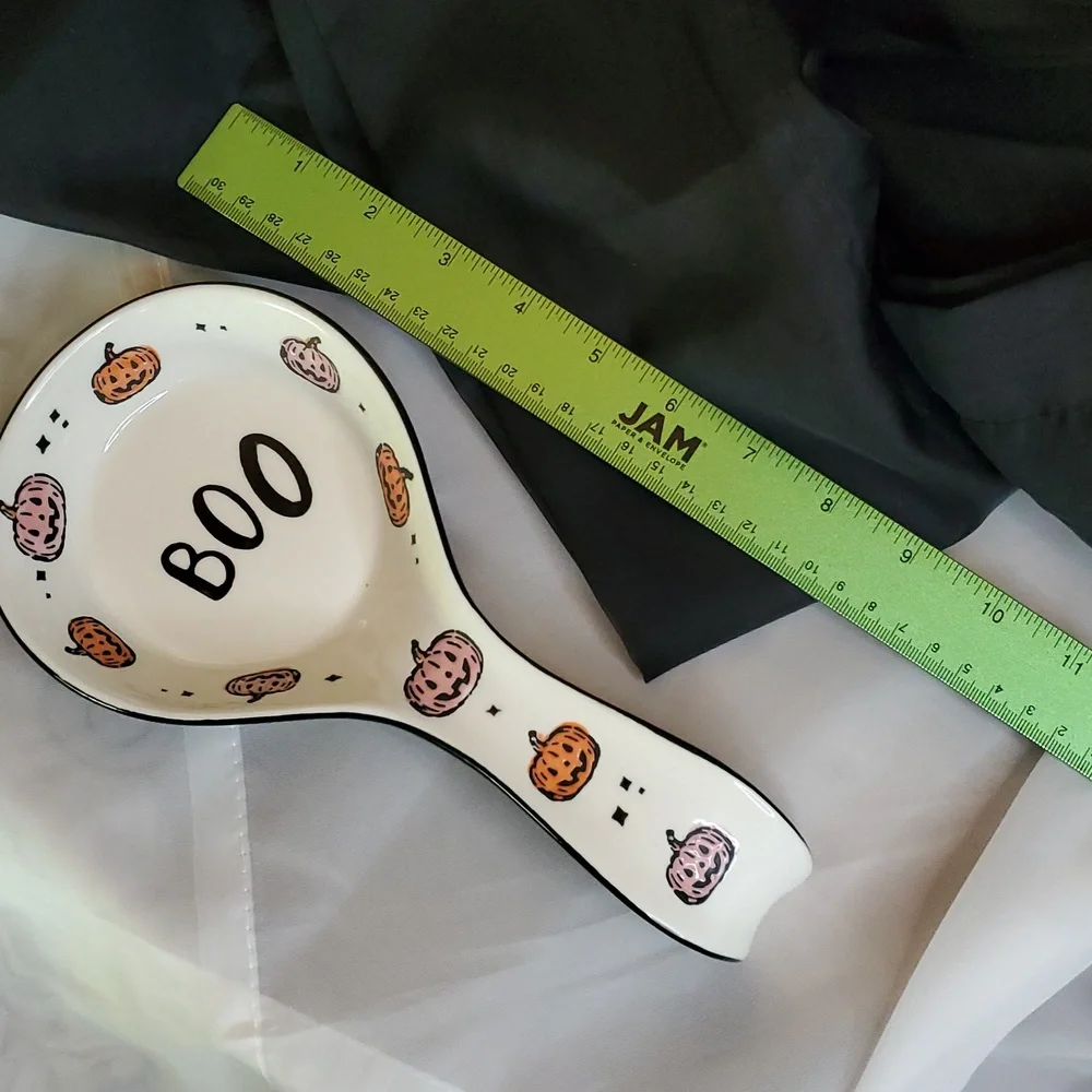 N/A white spoon