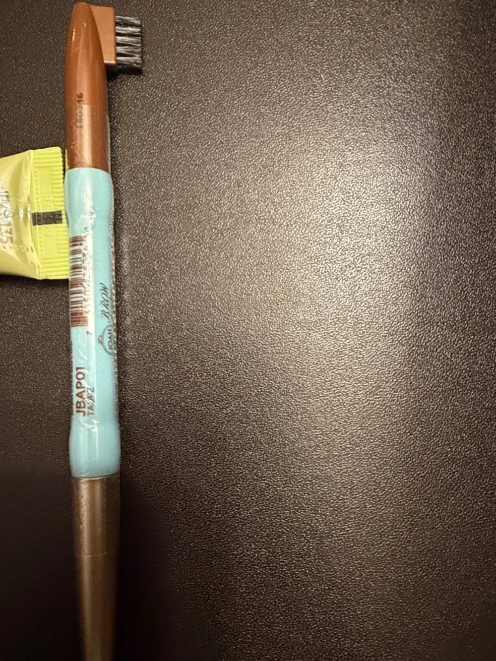 eyebrow beige brush
