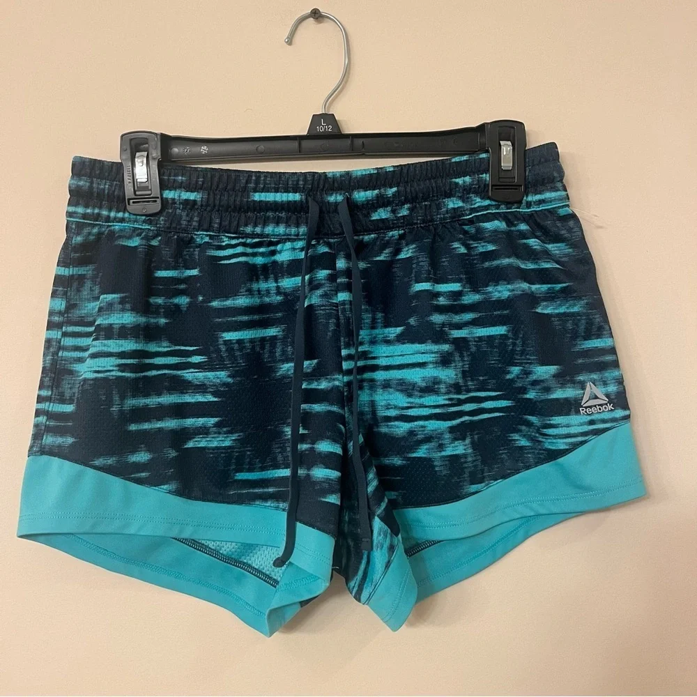 Women’s size small Reebok blue teal elastic waist running shorts athletic