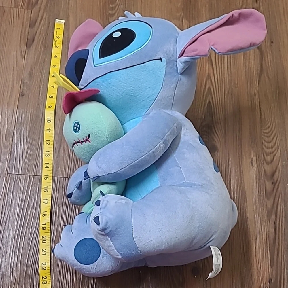 Disney Blue and‎ Pink Stitch Plush with Green Doll used good condition.