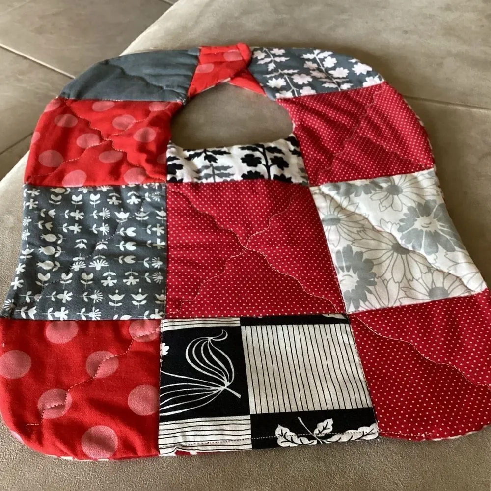 NWT , quilted reversible, handcrafted, baby bib reds