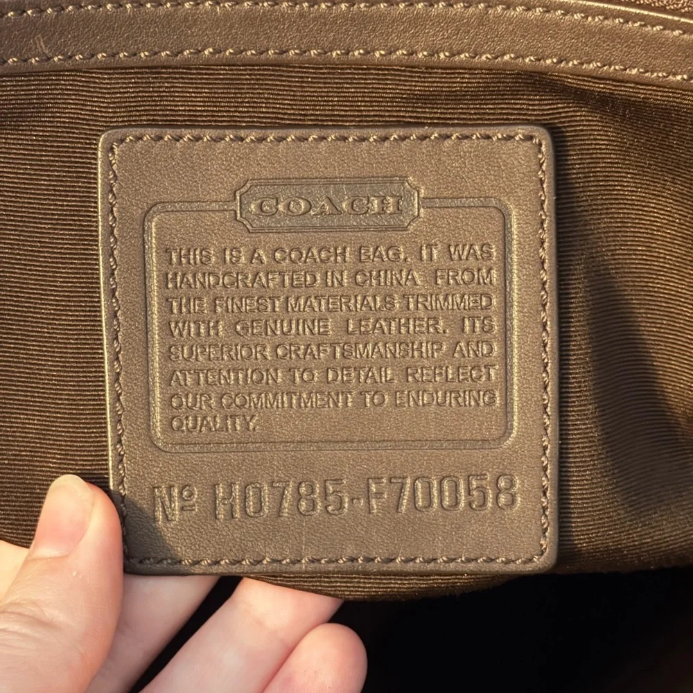 Coach includes hangtag
