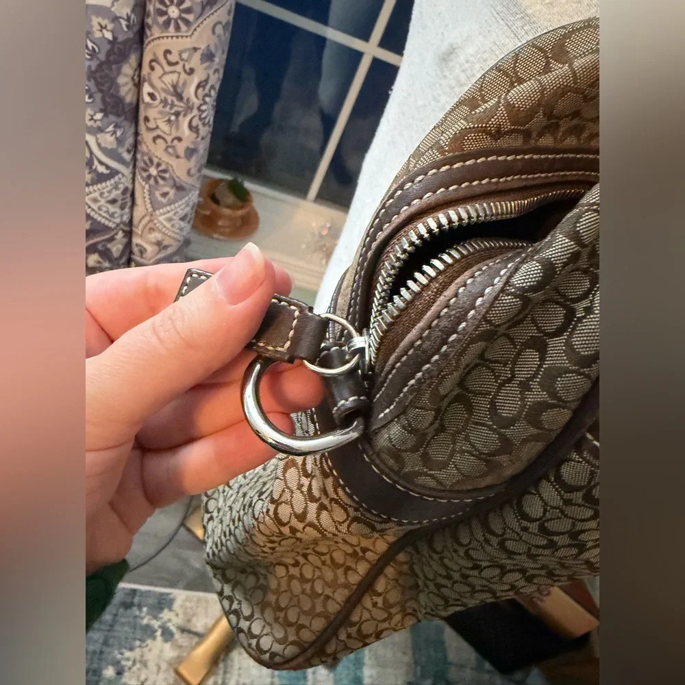 Coach includes hangtag