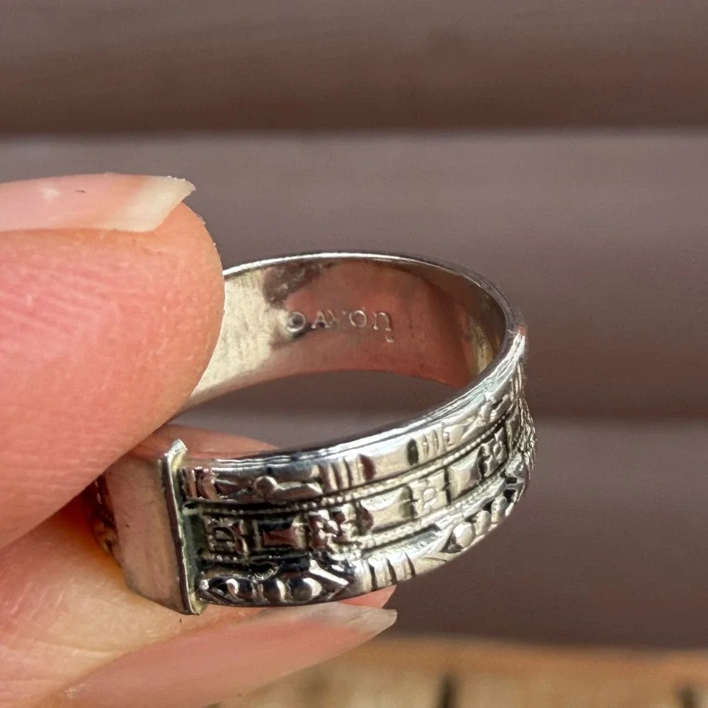 Avon silver tone