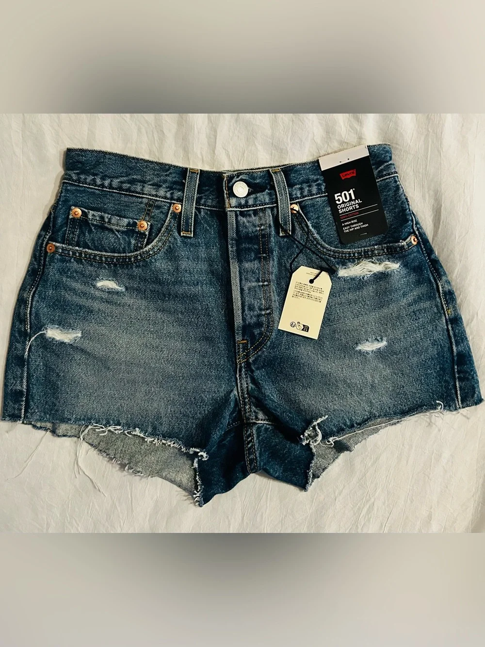 NWT Levi's 501 Distressed Denim Shorts in Dark Blue