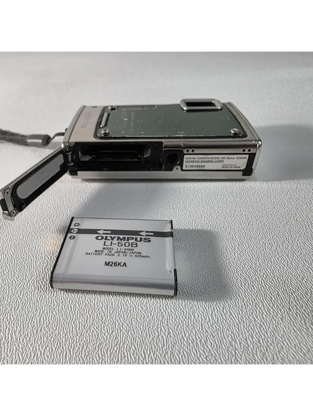 Olympus selling re