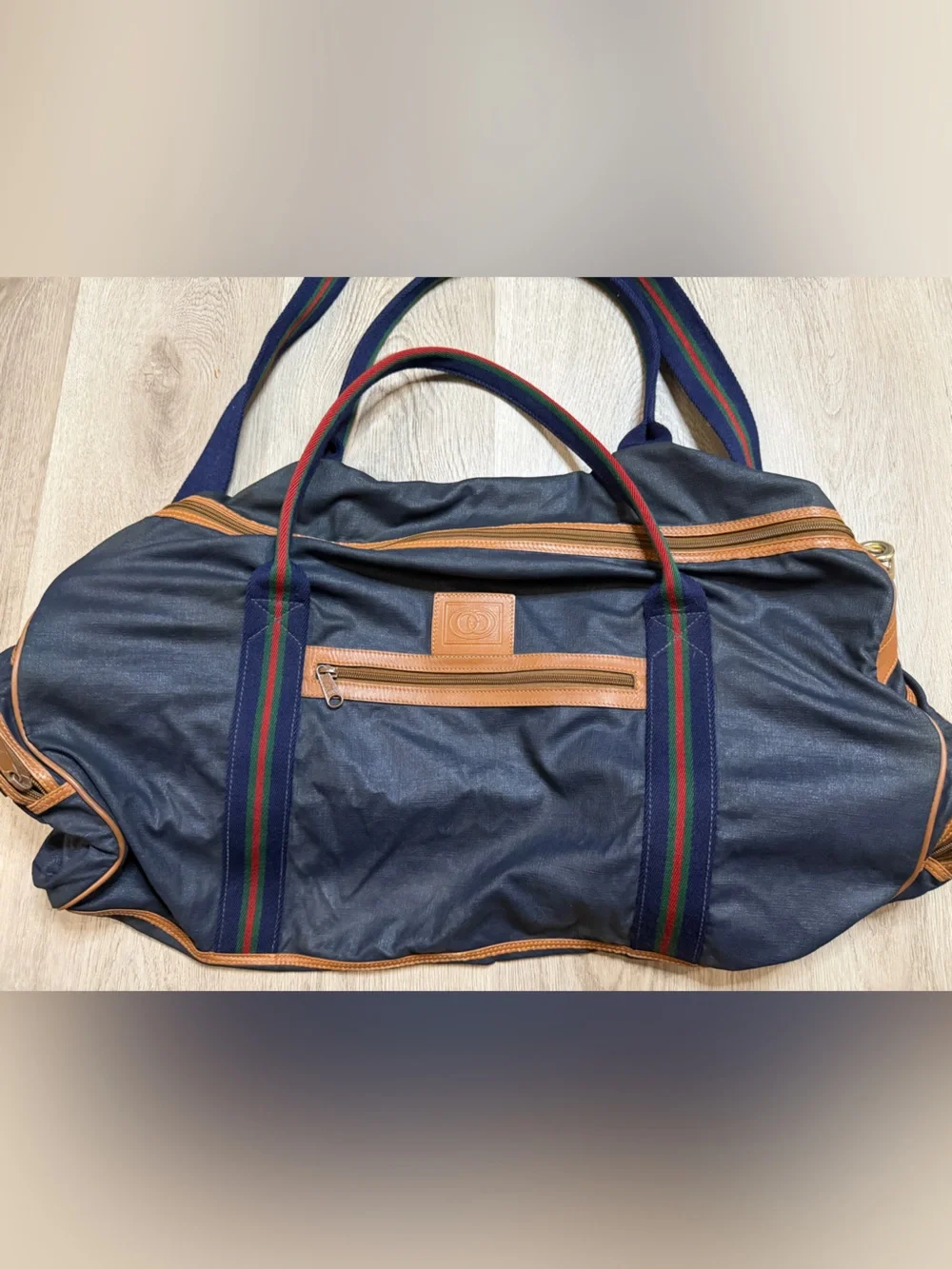Gucci Navy Duffel Bag with Tan Leather Trim and Red-Green Stripe Webbing
