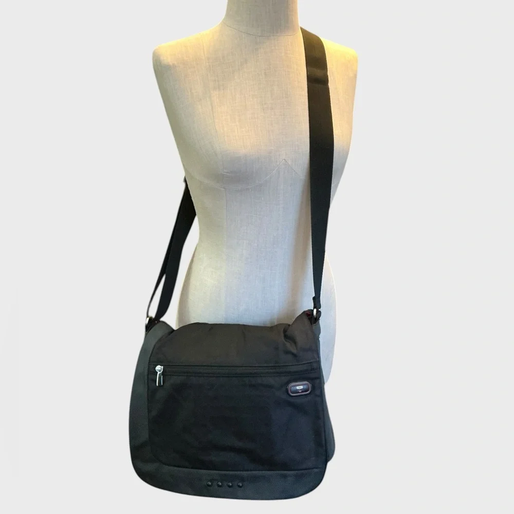 Tumi tech crossbody