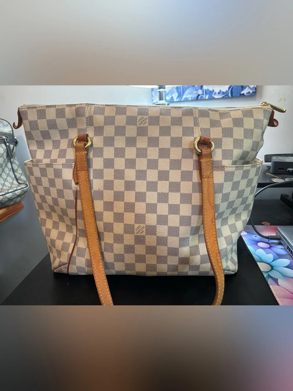Louis Vuitton please review