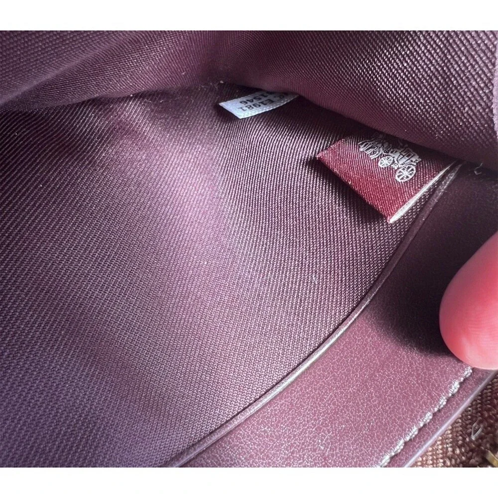 Coach accordion zip