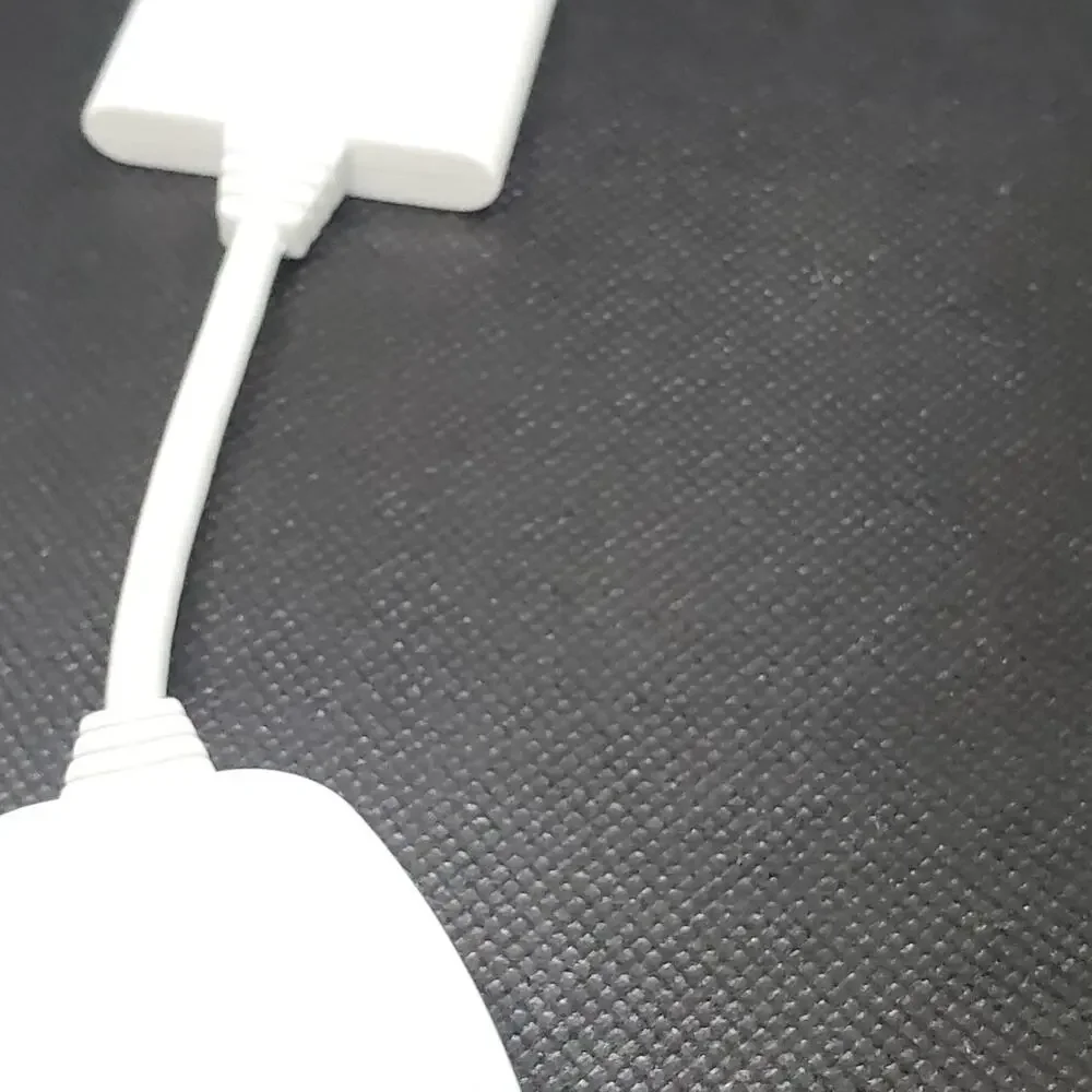 white adapter cable for the Xbox 360 console