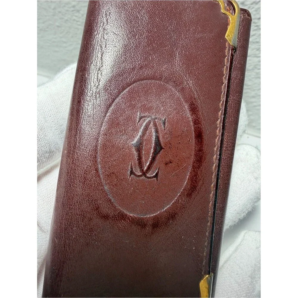 Cartier Brownish Red Leather Card Holder with Gold Corner Accents