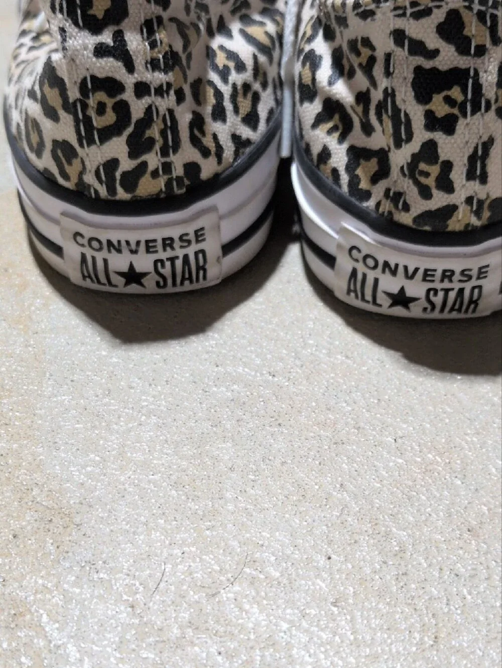Converse leopard print