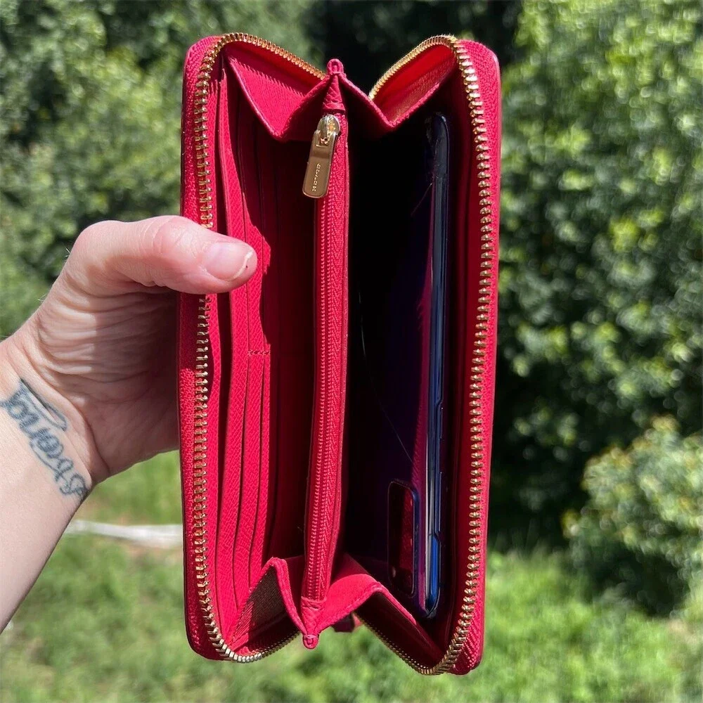 Coach accordion zip