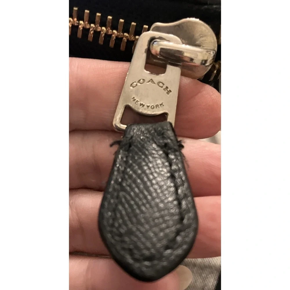 Coach accordion zip