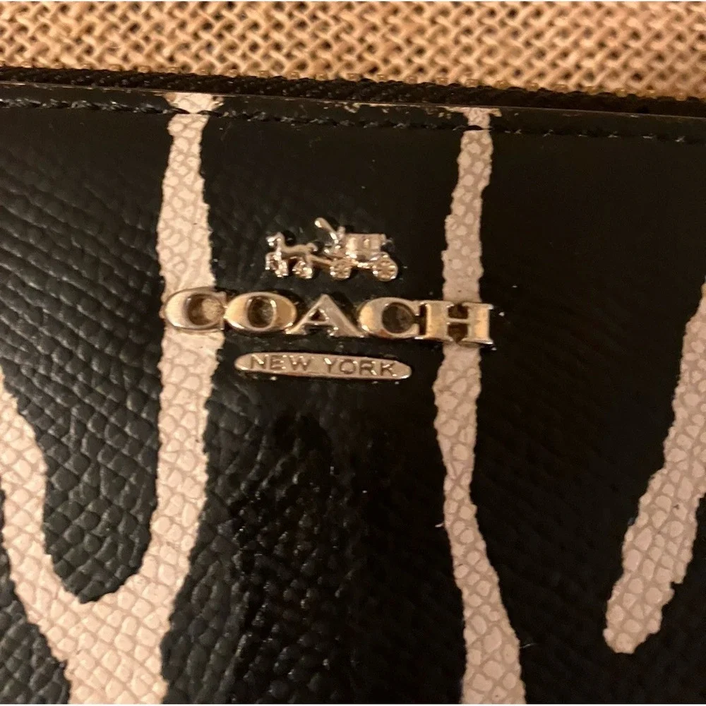 Coach accordion zip