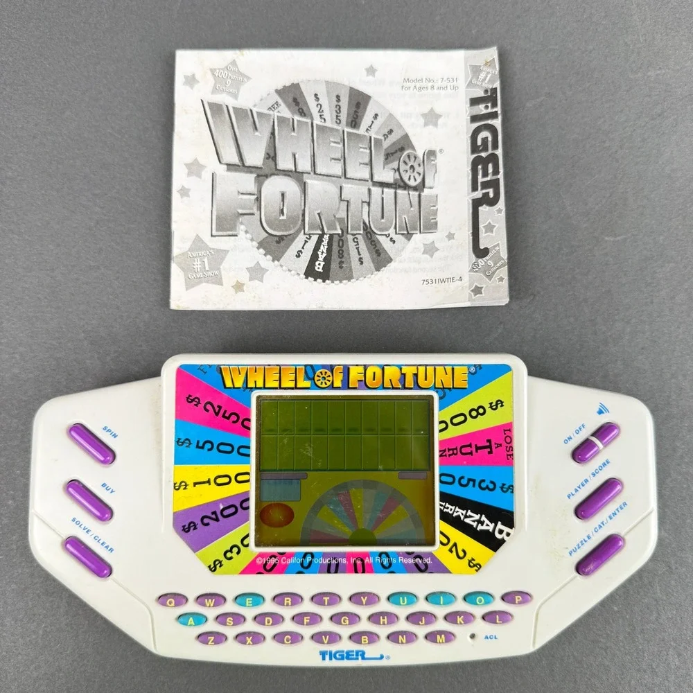 Tiger Wheel of Fortune Game 1995 Handheld Electronic Game - TESTED
