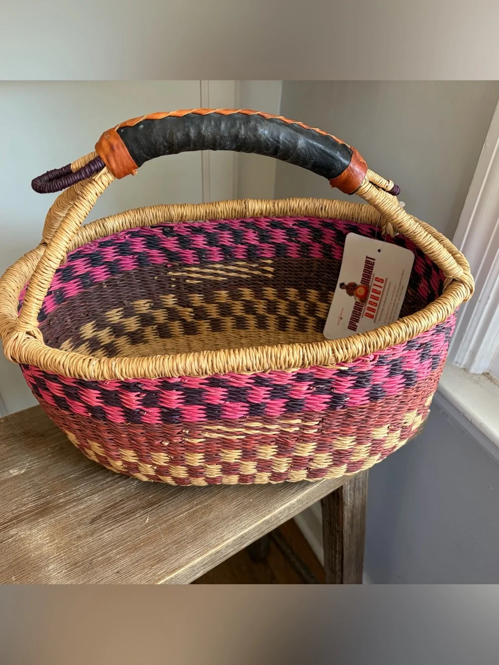African Handwoven Ghanaian Straw Basket with Leather Handle pink red beige