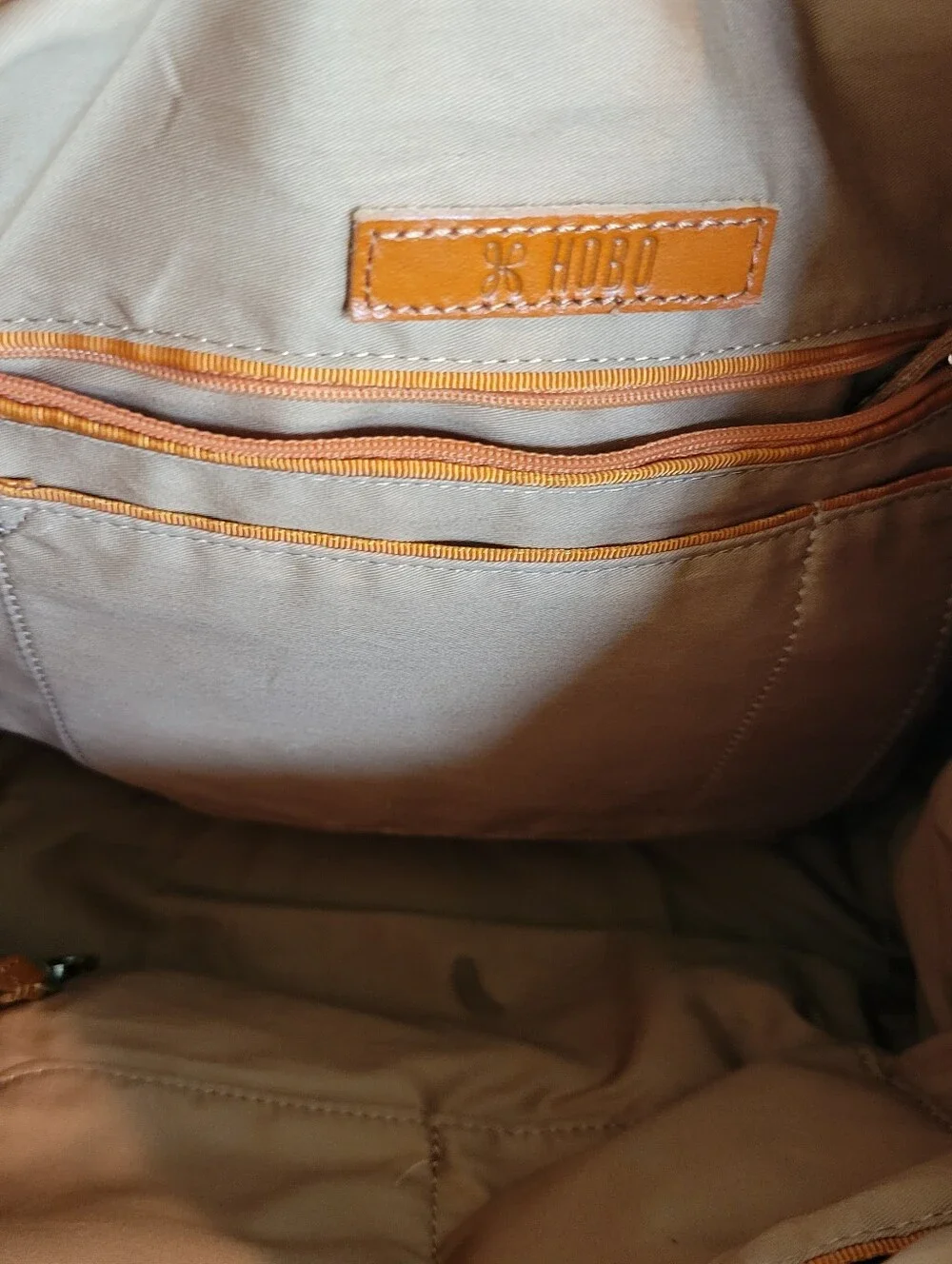 Hobo Classic Brown Leather Tote Bag With Roomy Interior.
