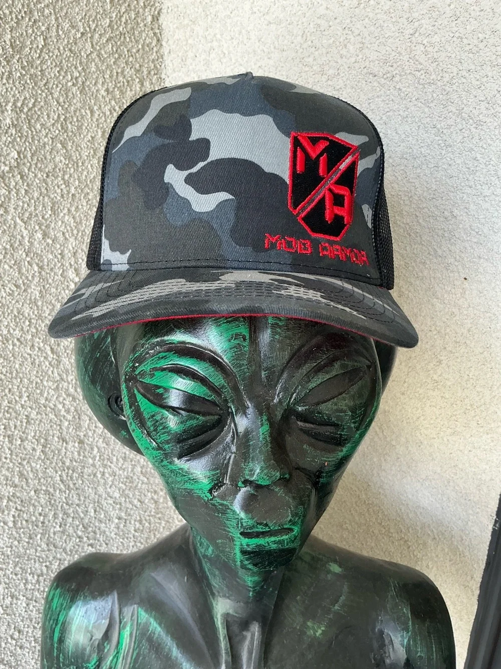 Mob Armor Black & Gray Camo Trucker Hat with Red Logo