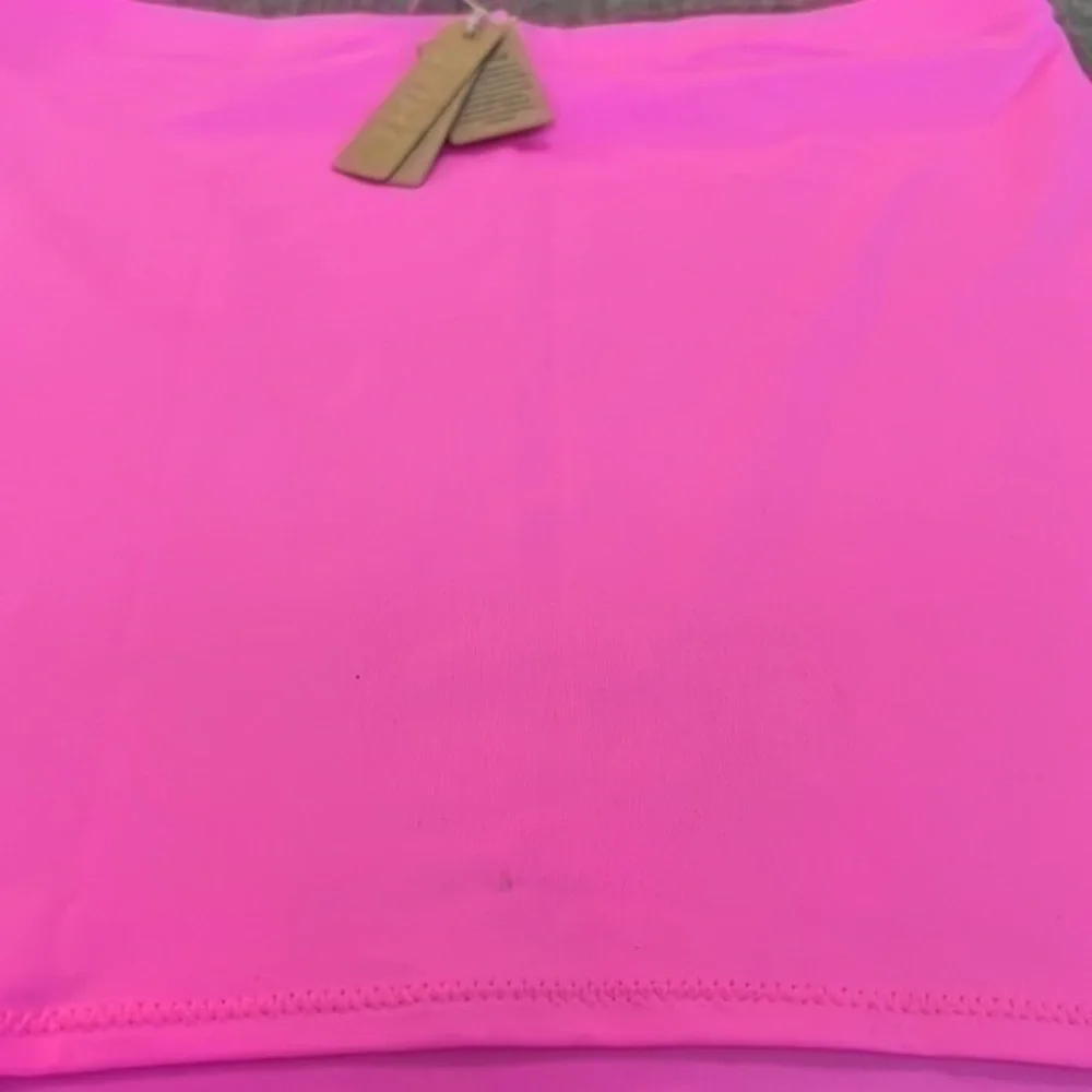 SKIMS swim tube