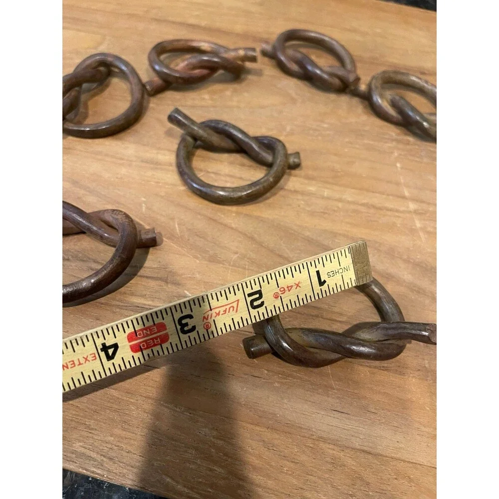 Set of 8 hand-forged iron napkin rings