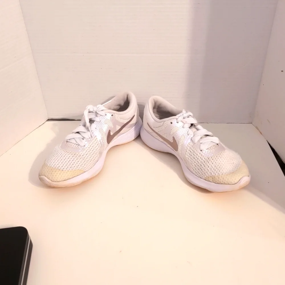 Nike white revolution