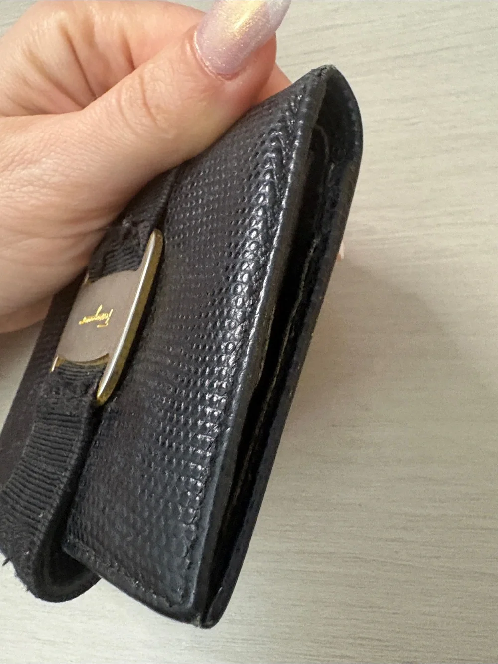 Salvatore Ferragamo buckle see signature