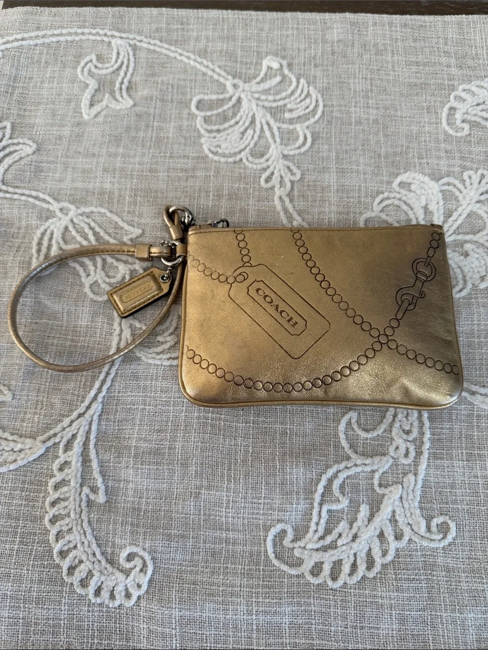 Coach wristlet metallic