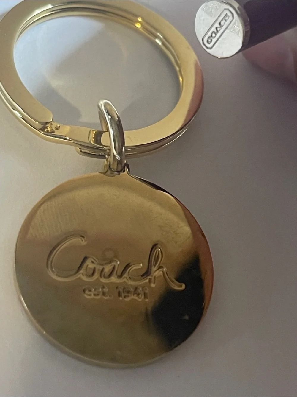 Coach legacy gold